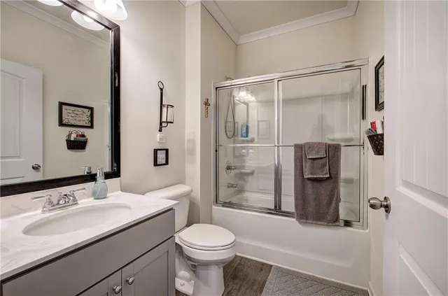 a kitchen with stainless steel appliances granite countertop a sink a refrigerator and window