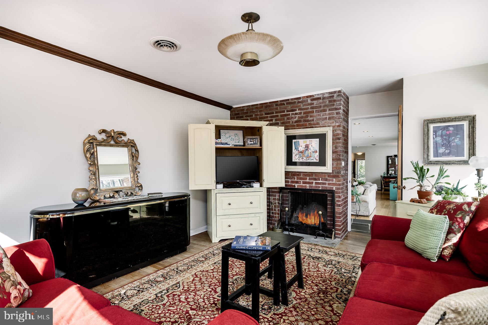 52 Winant Road Princeton, NJ 08540 - Photo 11 of 32 a living room with furniture and a fireplace