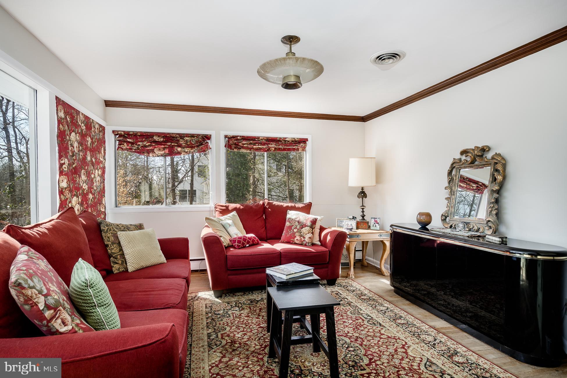 52 Winant Road Princeton, NJ 08540 - Photo 12 of 32 a living room with furniture a flat screen tv and a window
