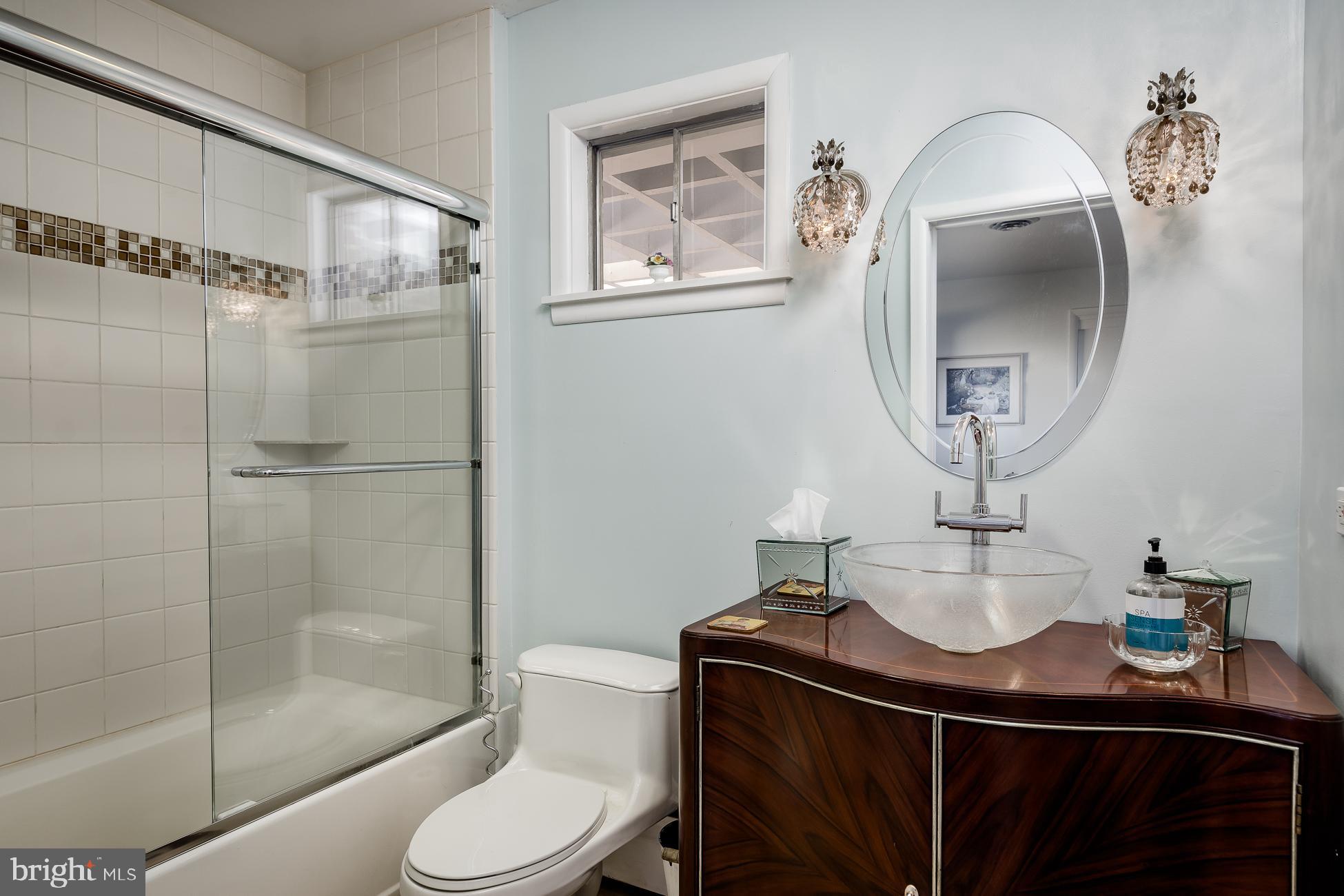 52 Winant Road Princeton, NJ 08540 - Photo 20 of 32 a bathroom with a toilet a sink and mirror