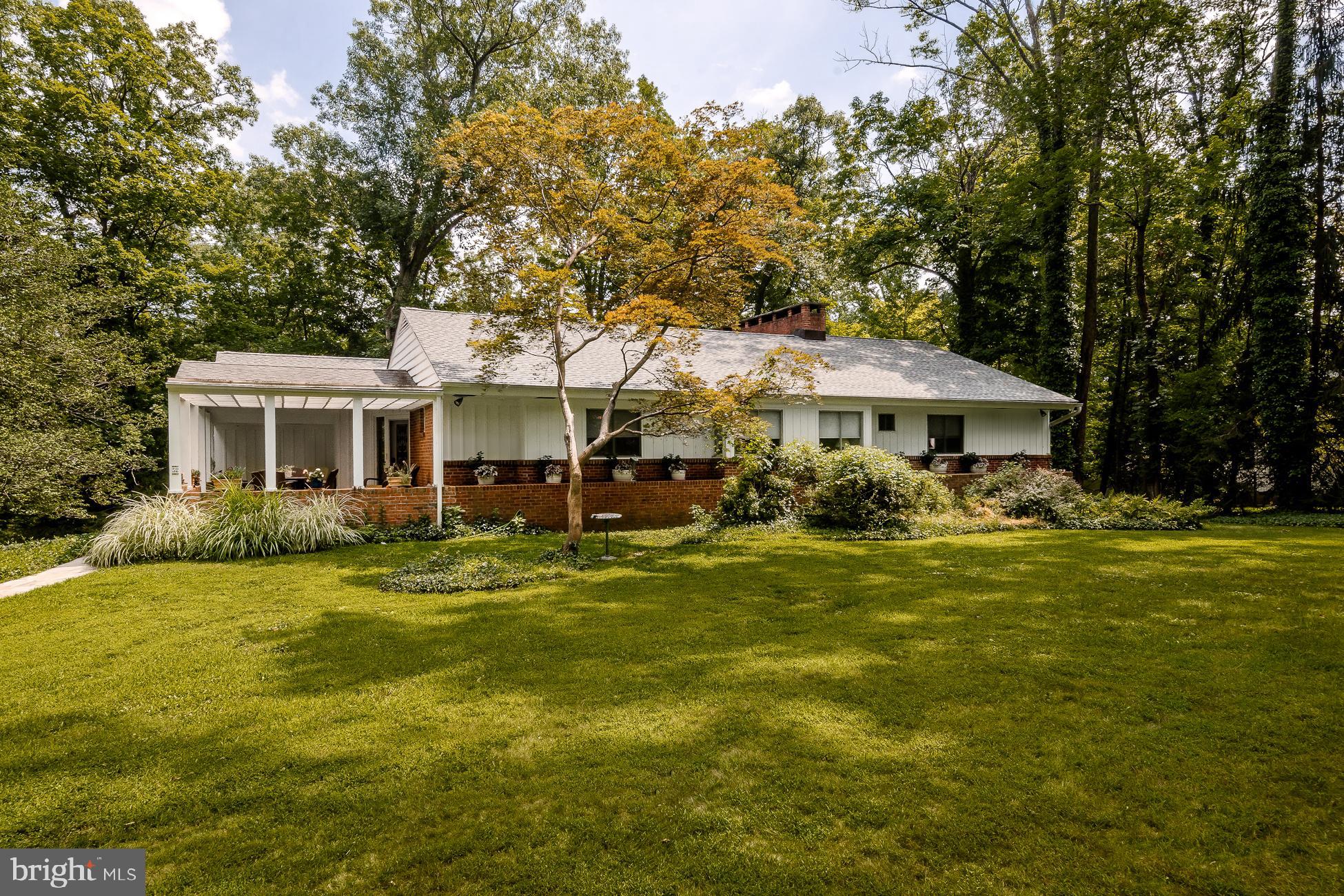 52 Winant Road Princeton, NJ 08540 - Photo 3 of 32 a front view of a house with a garden