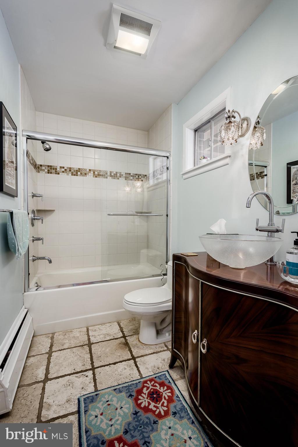 52 Winant Road Princeton, NJ 08540 - Photo 21 of 32 a bathroom with a sink toilet and shower