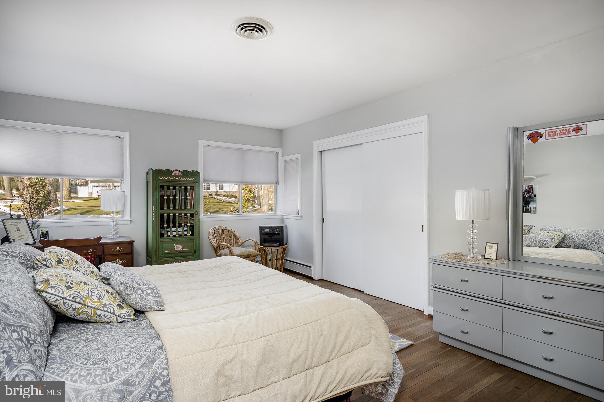 52 Winant Road Princeton, NJ 08540 - Photo 22 of 32 a bedroom with a large bed and windows