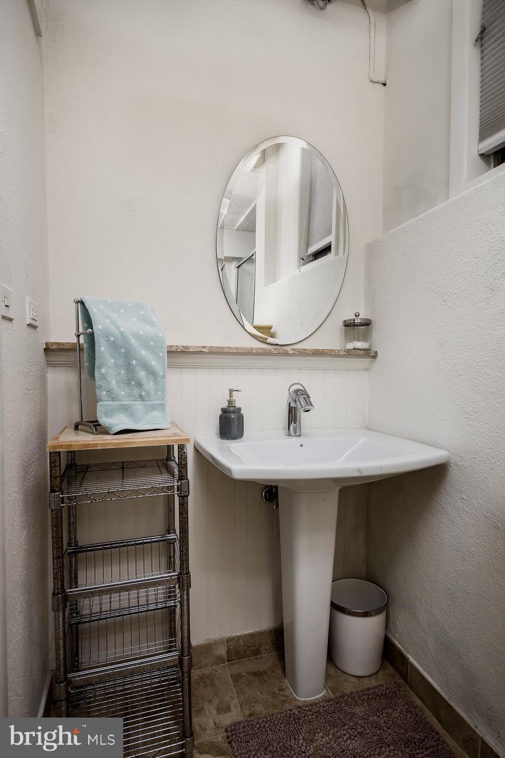 52 Winant Road Princeton, NJ 08540 - Photo 24 of 32 a bathroom with a sink and a mirror