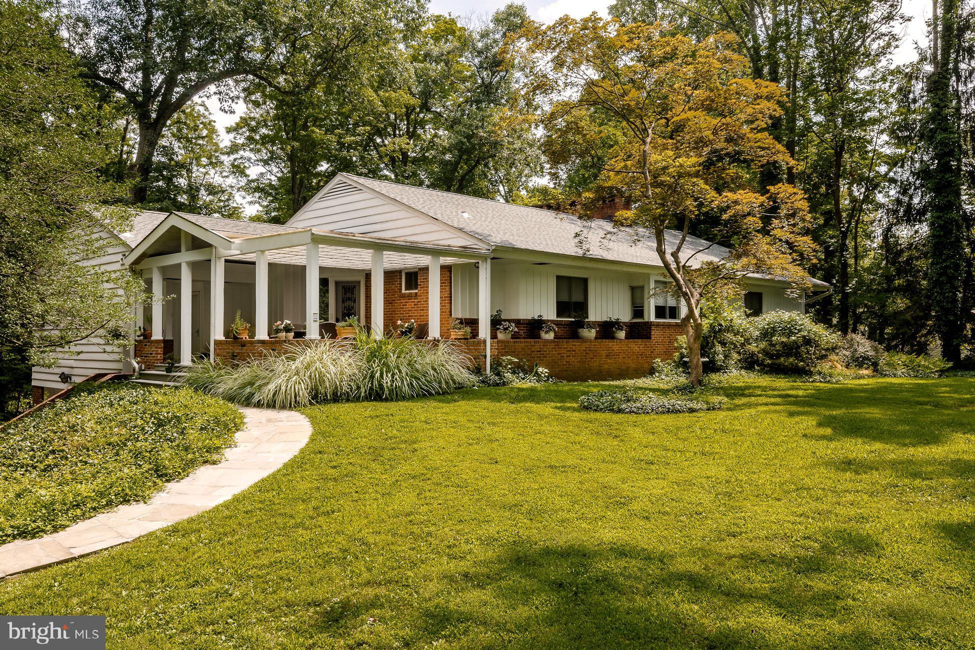 52 Winant Road Princeton, NJ 08540 - Photo 26 of 32 a front view of a house with swimming pool having outdoor seating