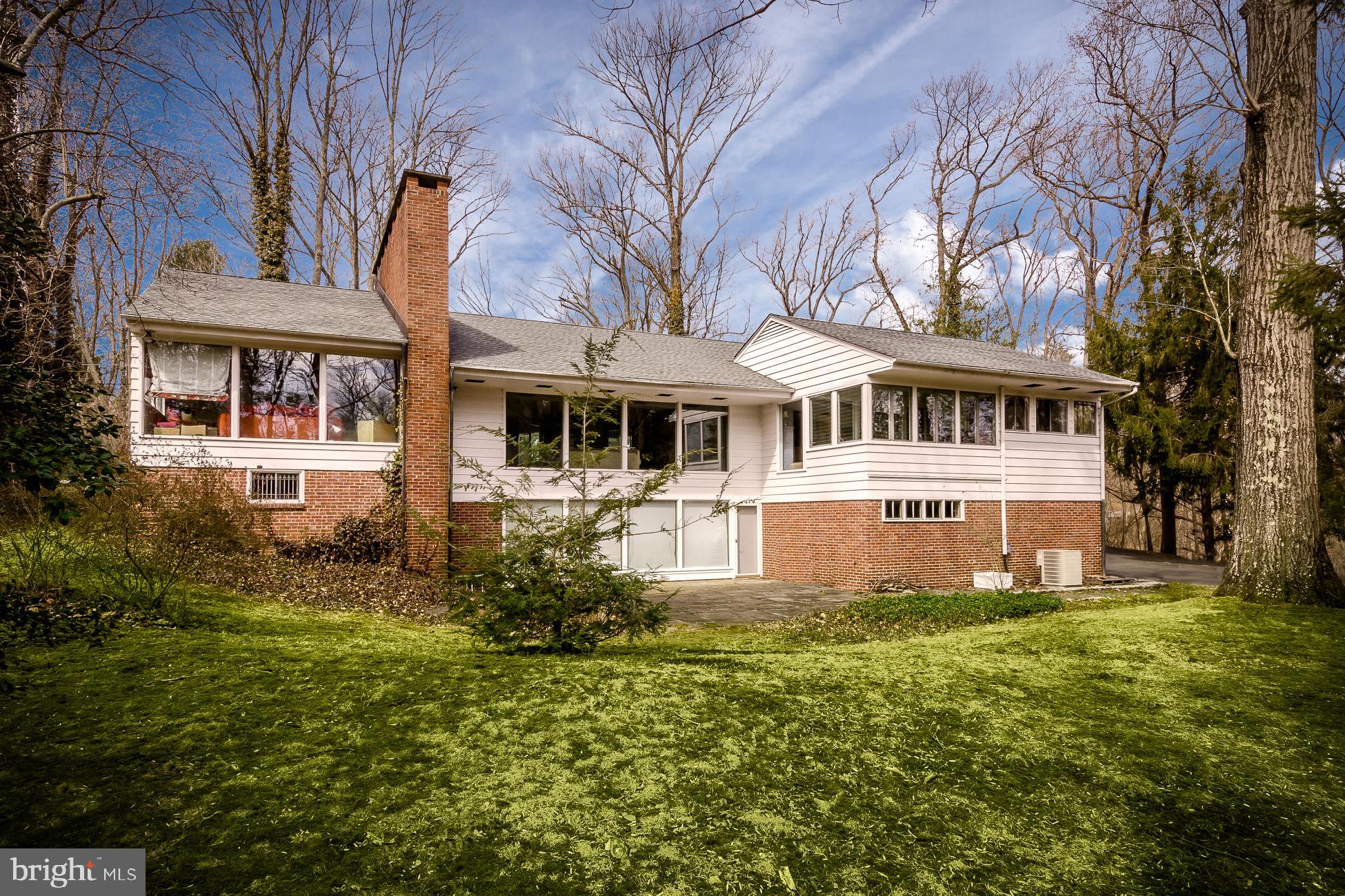 52 Winant Road Princeton, NJ 08540 - Photo 28 of 32 a front view of a house with a garden