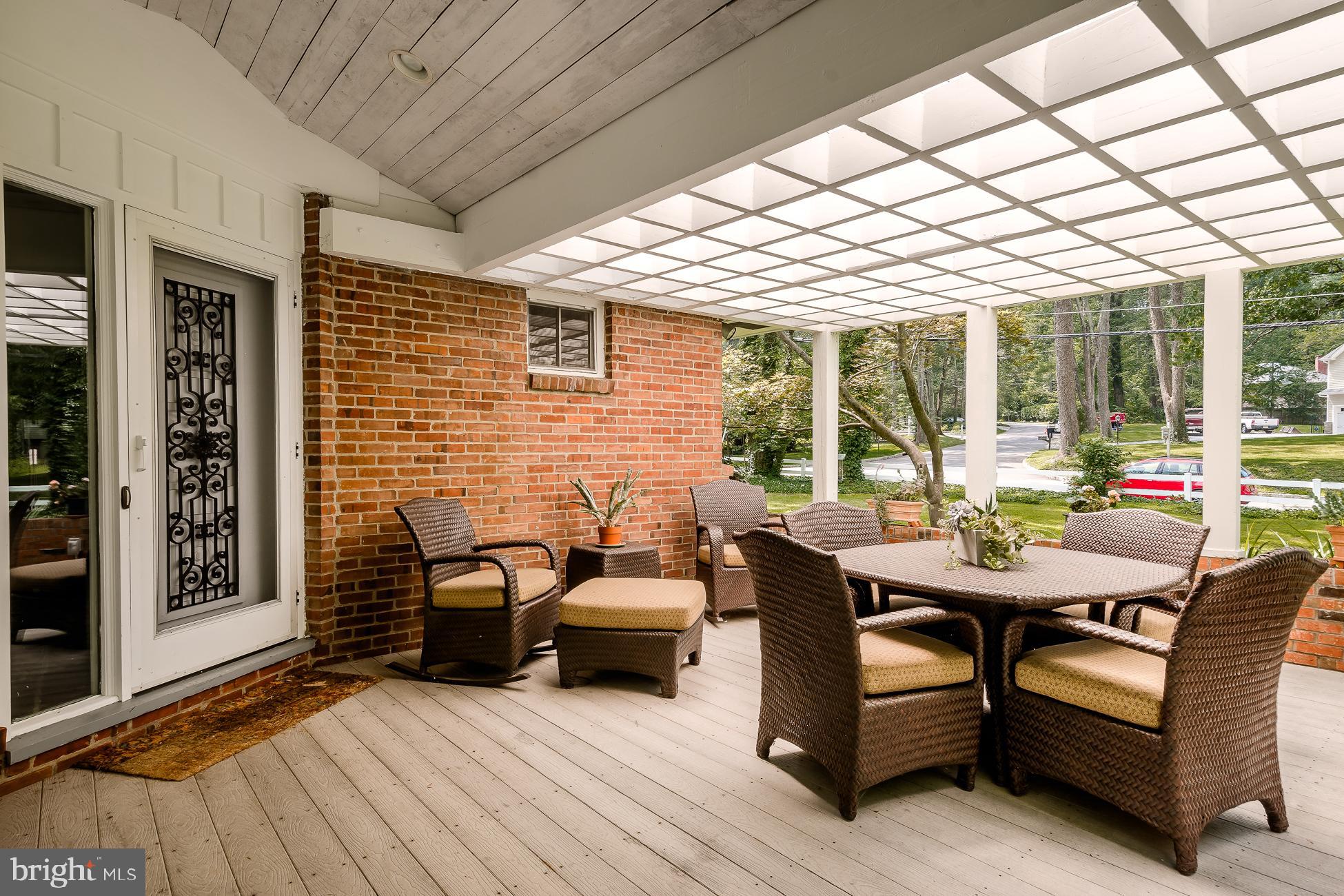 52 Winant Road Princeton, NJ 08540 - Photo 5 of 32 a backyard of a house with barbeque oven table and chairs