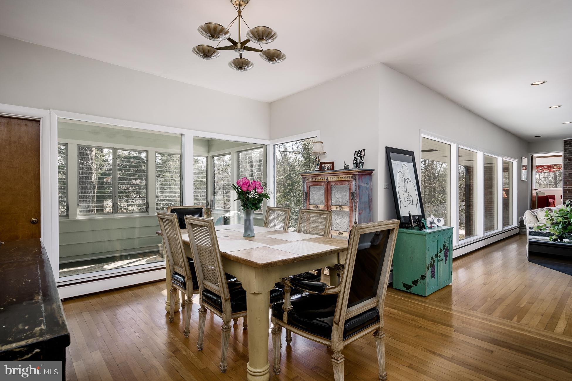 52 Winant Road Princeton, NJ 08540 - Photo 10 of 32 a view of a dining room with furniture window and wooden floor