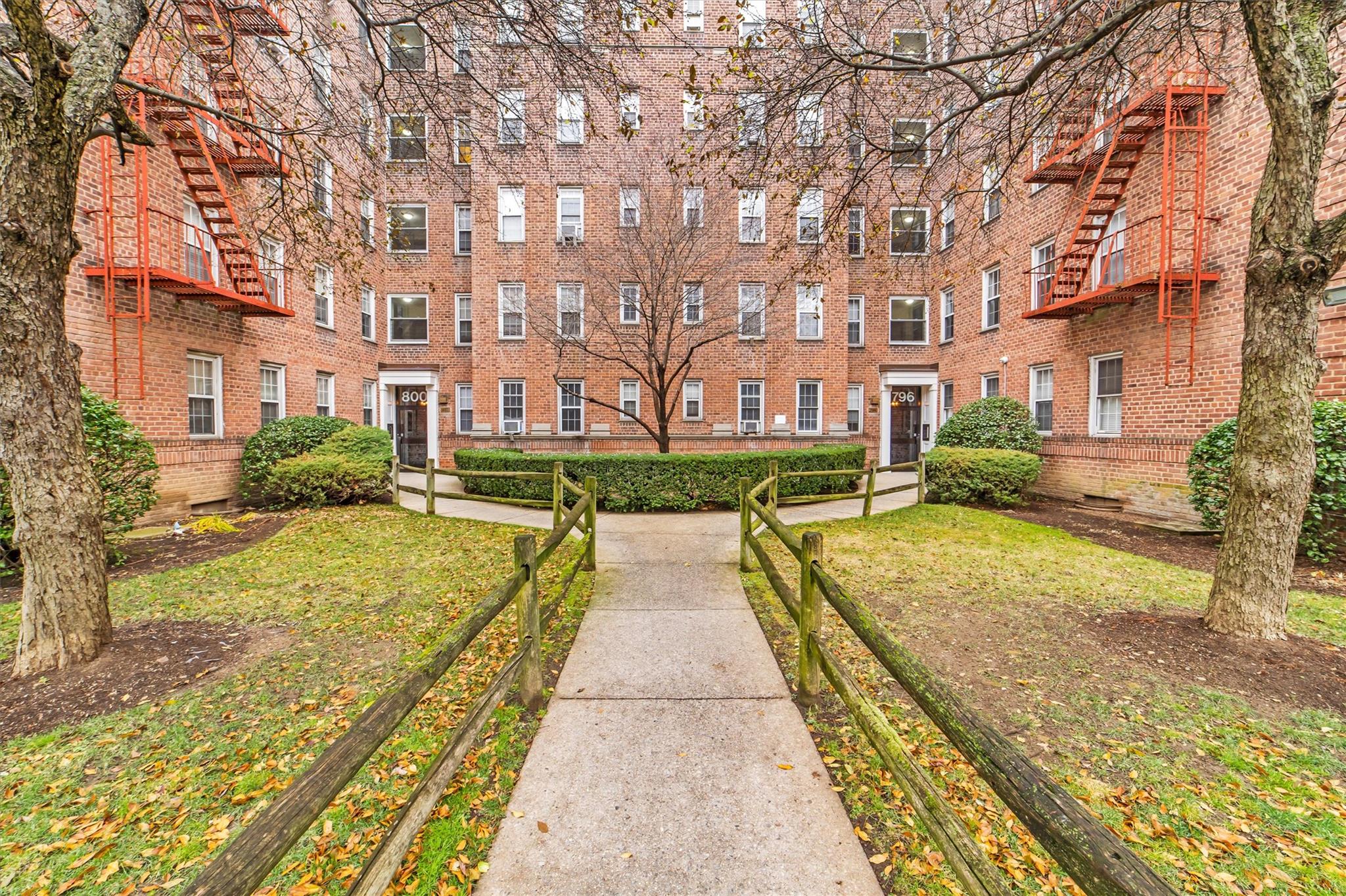 View of community featuring a yard