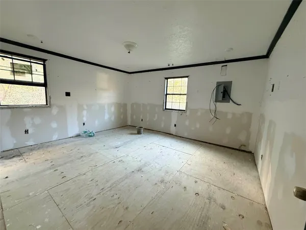 an empty room with windows