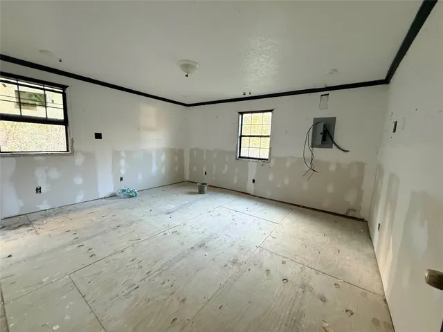 an empty room with windows