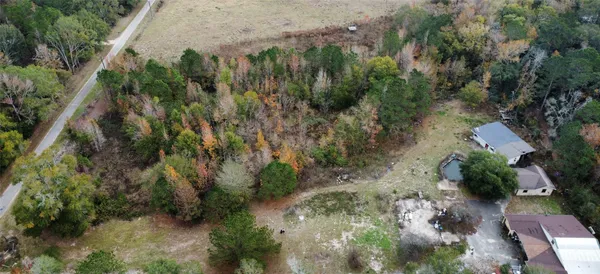 an aerial view of residential house with outdoor space