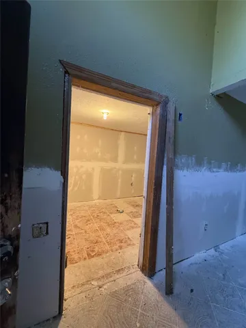 view of an empty room and window