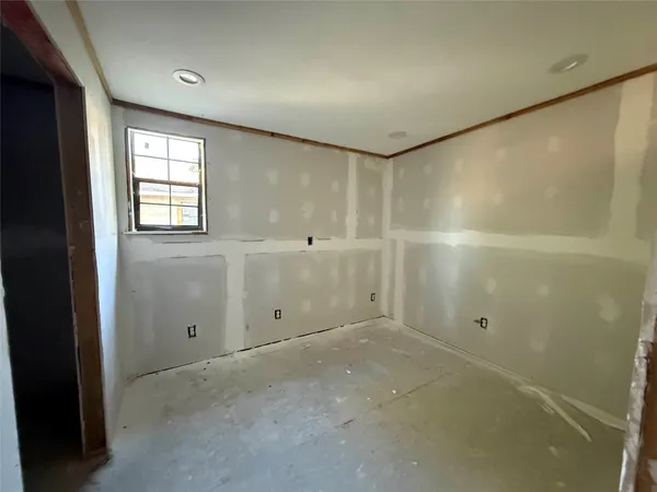 a bathroom with a toilet sink and shower