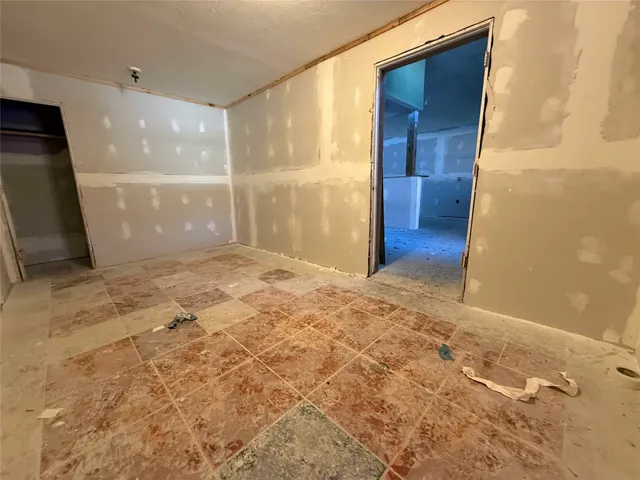 a bathroom with a double vanity sink and mirror