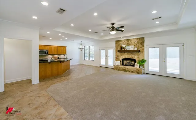 a stove top oven sitting inside of a kitchen