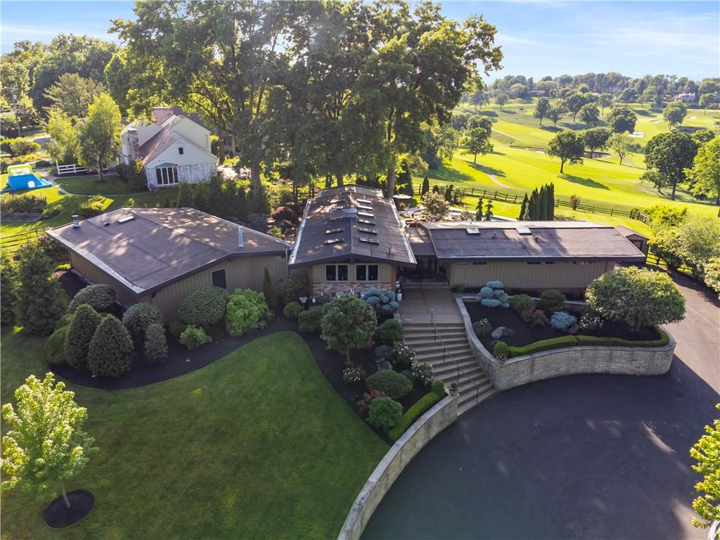 1789 Hastings Mill Road Pittsburgh, PA 15241 - Photo 2 of 46 an aerial view of a house with a garden and lake view
