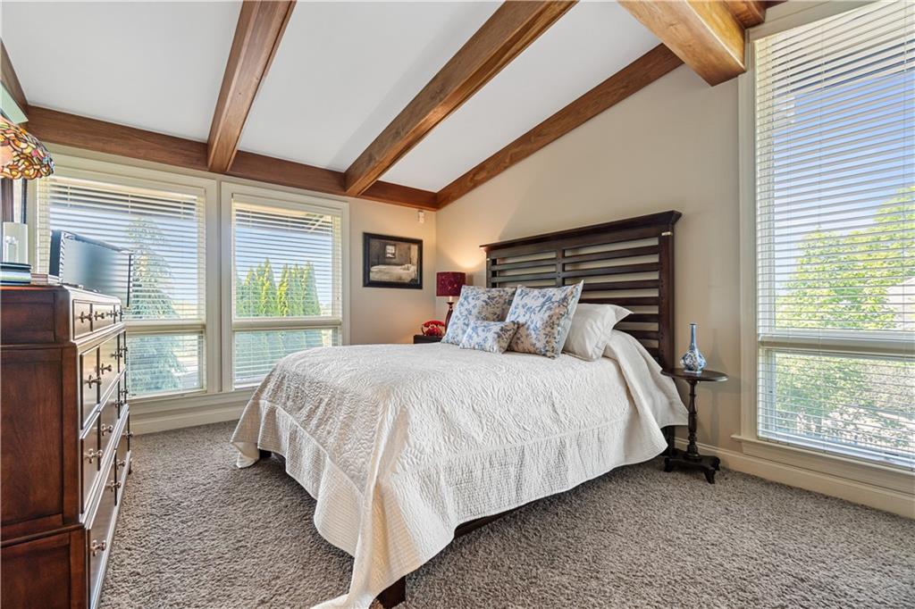 1789 Hastings Mill Road Pittsburgh, PA 15241 - Photo 26 of 46 a bed sitting in a bedroom next to a window