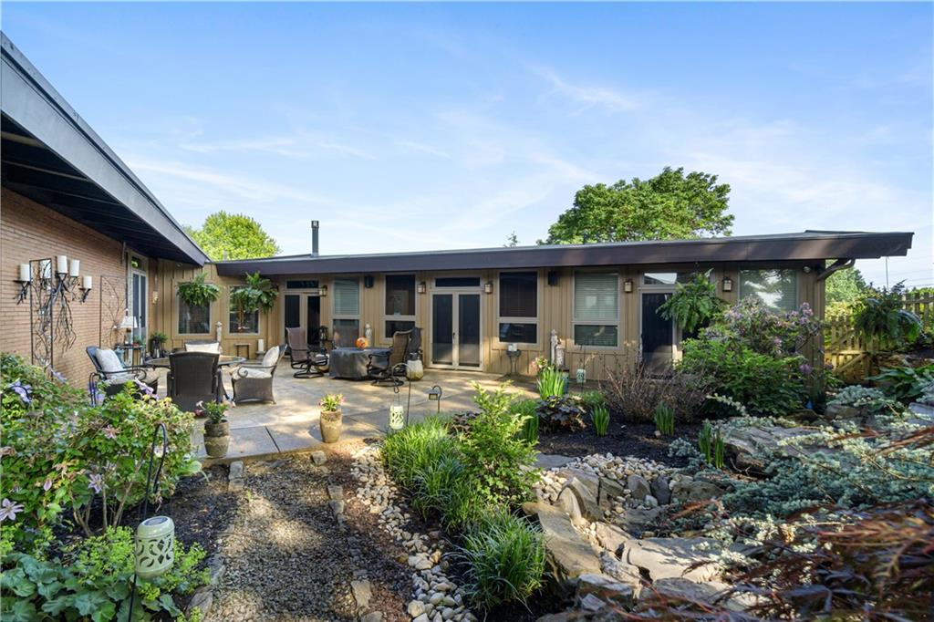 1789 Hastings Mill Road Pittsburgh, PA 15241 - Photo 43 of 46 a view of a house with sitting area and garden