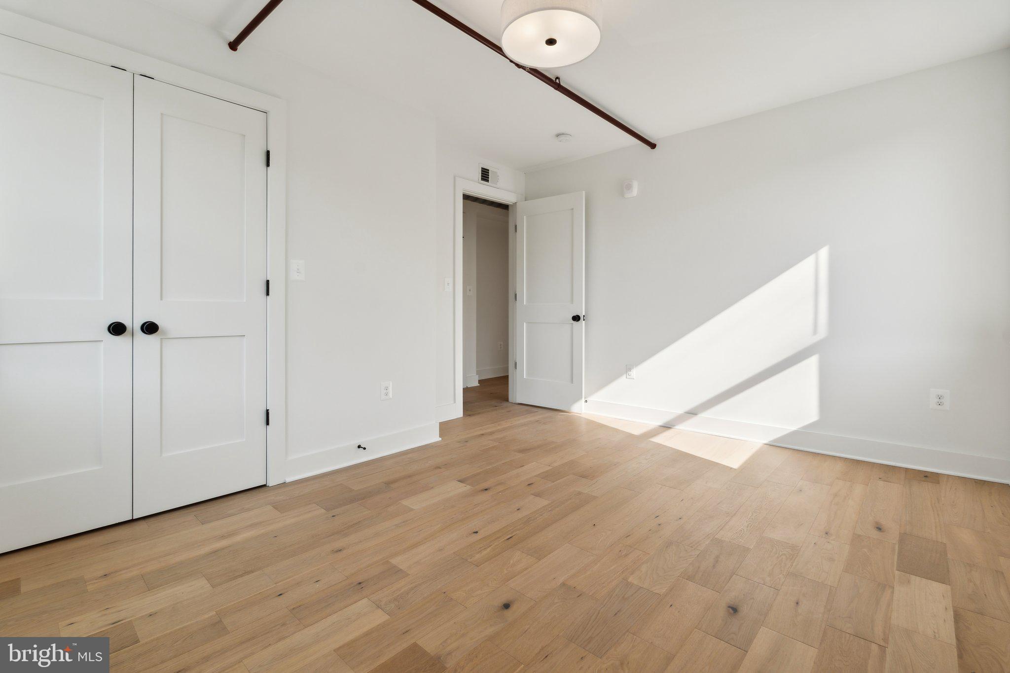 901 King Street, Unit 203 Alexandria, VA 22314 - Photo 12 of 52 a view of an empty room