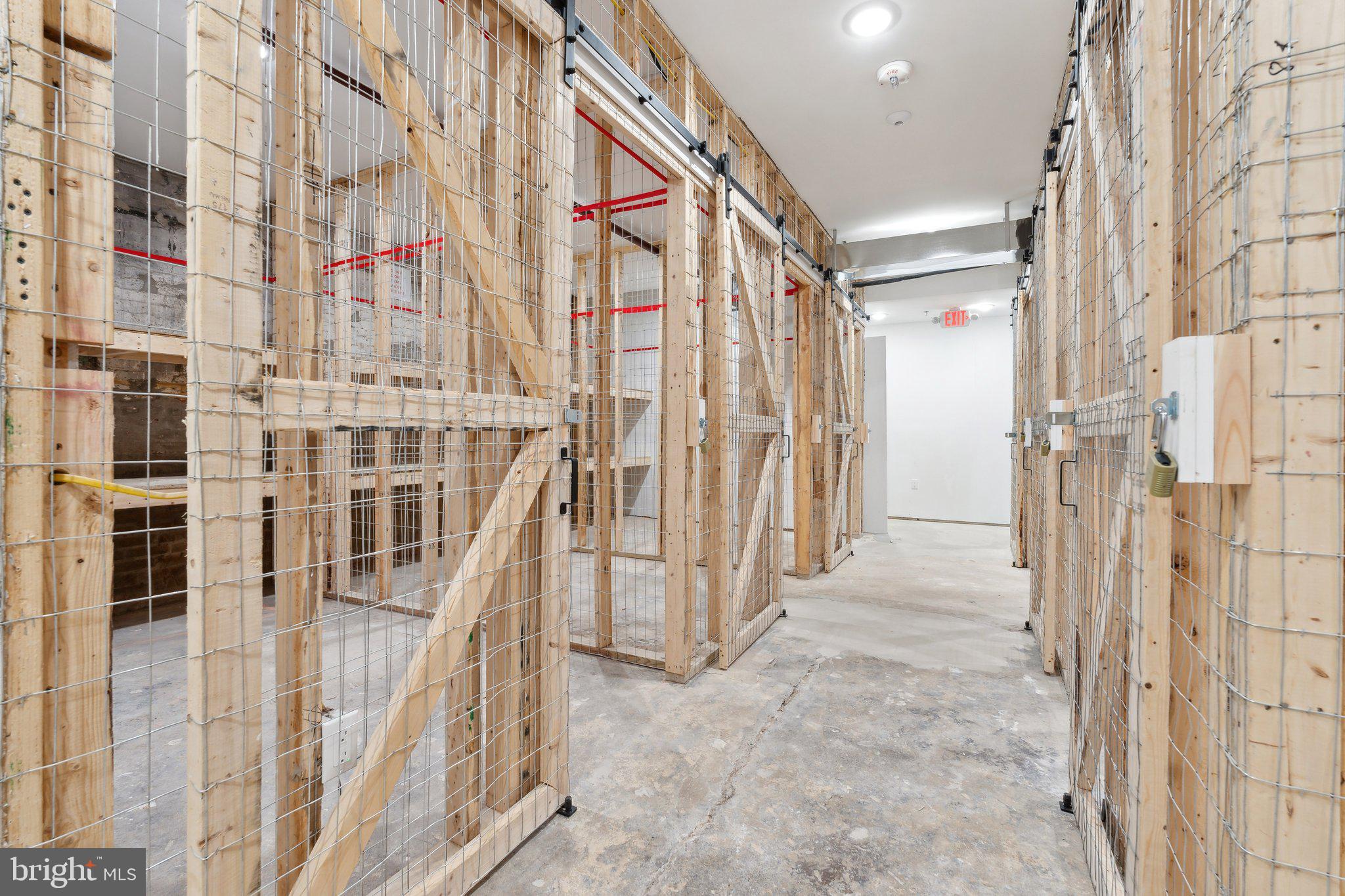 901 King Street, Unit 203 Alexandria, VA 22314 - Photo 29 of 52 a view of a building with a glass door