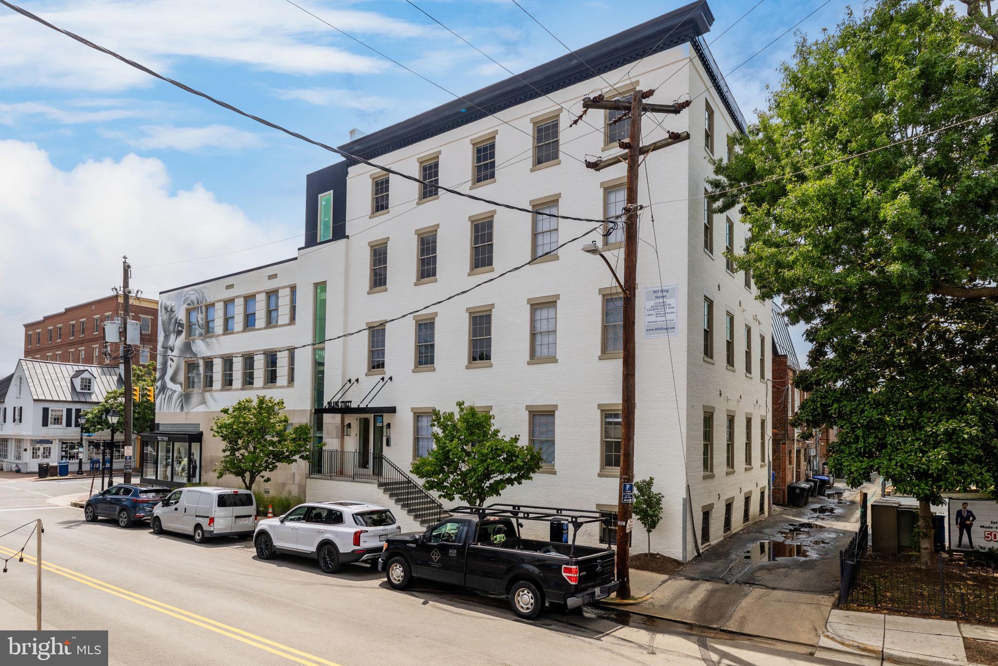 901 King Street, Unit 203 Alexandria, VA 22314 - Photo 35 of 52 a car parked in front of a building