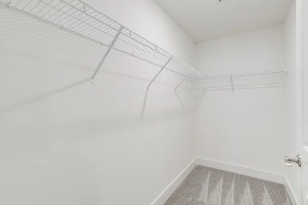 a view of a room with racks on the wall