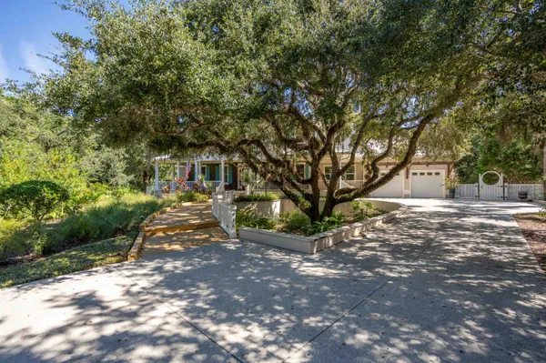 swimming pool view with a seating space