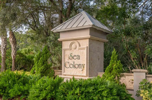 a view of a swimming pool and lounge chair