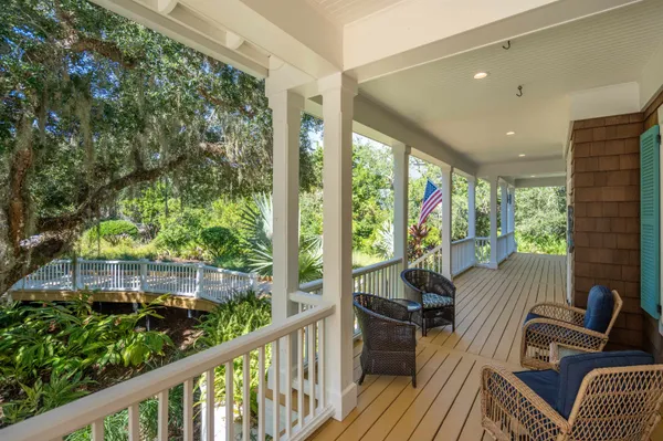 a view of balcony with furniture