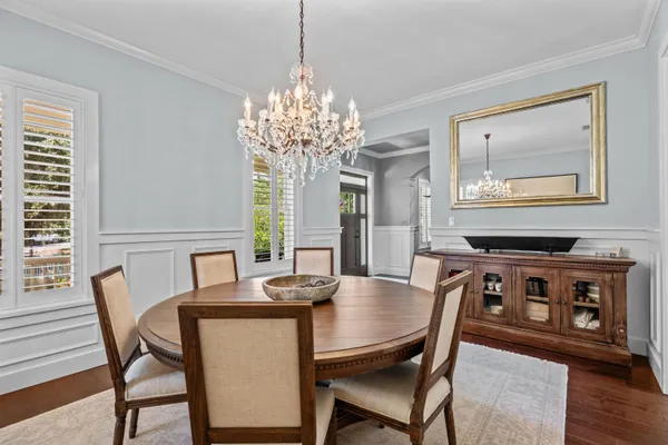 a view of a livingroom with furniture and windows