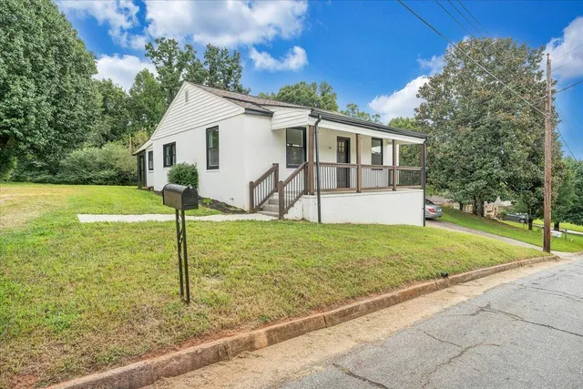 a house view with a backyard space