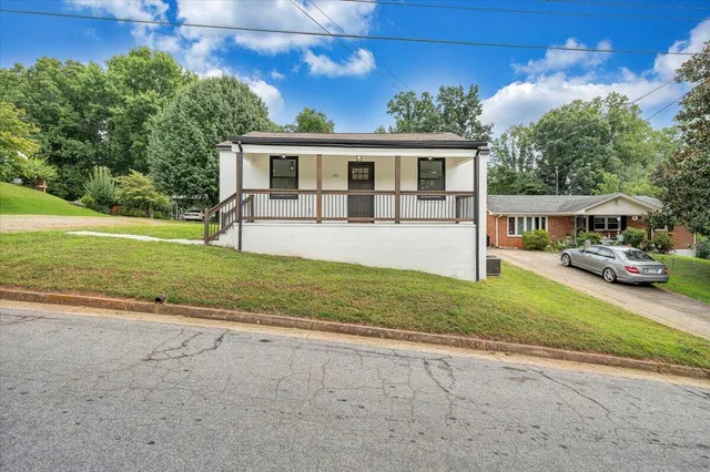 front view of a house with a big yard