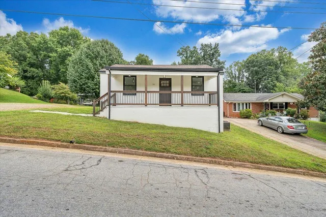 front view of a house with a big yard