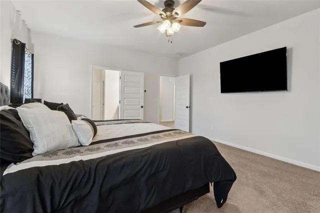 a bathroom with a double vanity sink a and mirror