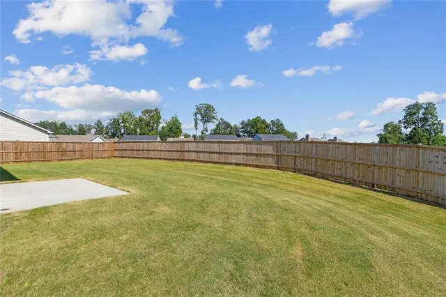 a view of an house with backyard space