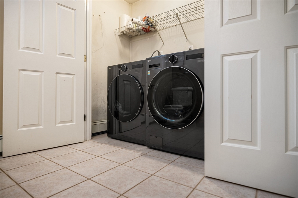 86 Hunter Road Uxbridge, MA 01569 - Photo 13 of 34 a utility room with dryer and washer