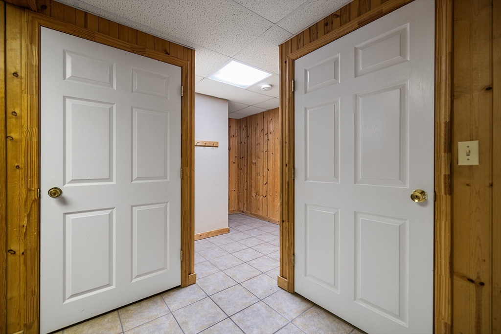 86 Hunter Road Uxbridge, MA 01569 - Photo 25 of 34 a view of a hallway with closet area