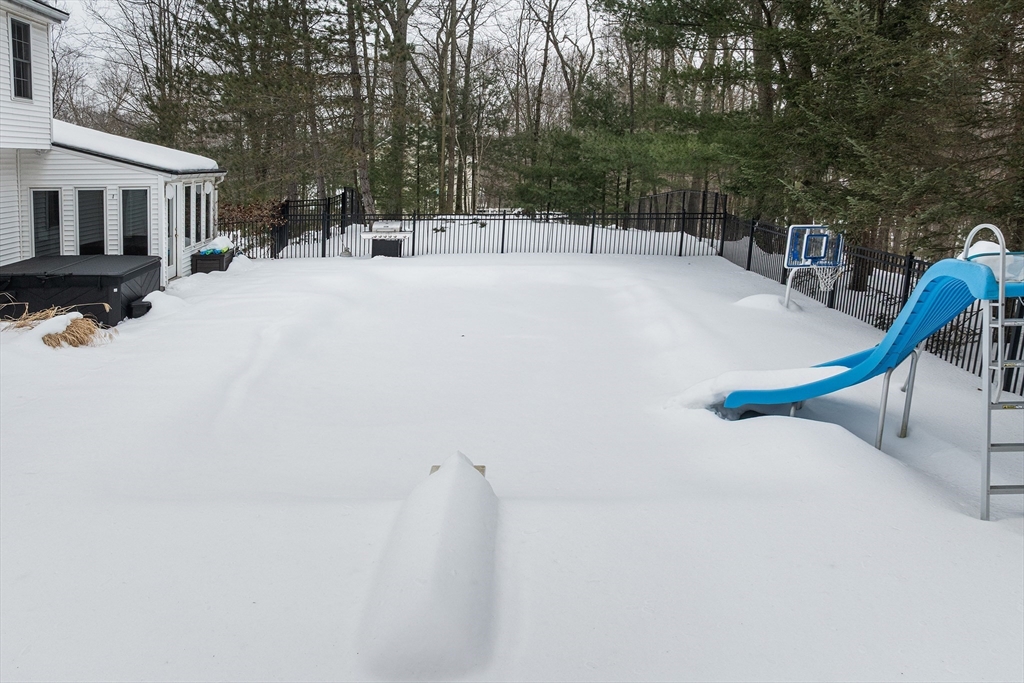 86 Hunter Road Uxbridge, MA 01569 - Photo 26 of 34 a swimming pool with outdoor seating and yard