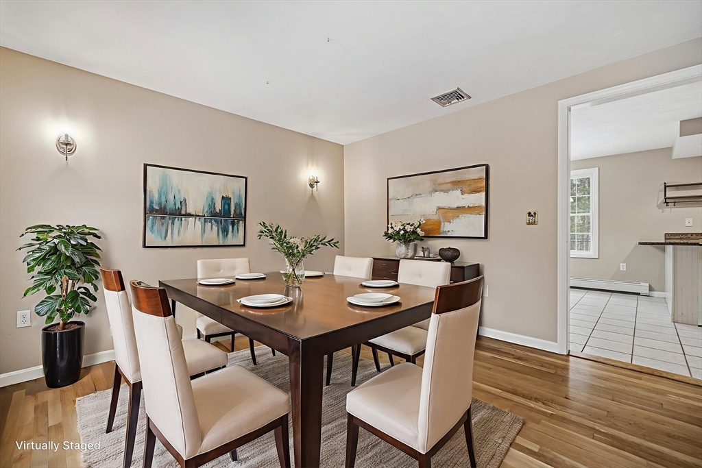 86 Hunter Road Uxbridge, MA 01569 - Photo 6 of 34 a view of a dining room with furniture and wooden floor