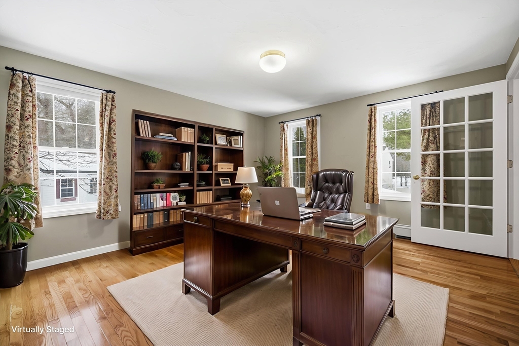86 Hunter Road Uxbridge, MA 01569 - Photo 10 of 34 a work room with furniture and window