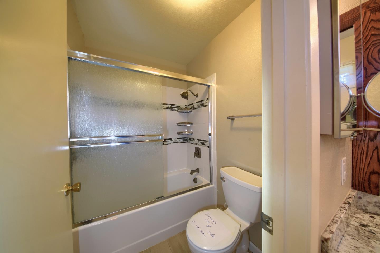 2911 Sunflower Drive Antioch, CA 94531 - Photo 40 of 69 a bathroom with a toilet and a shower