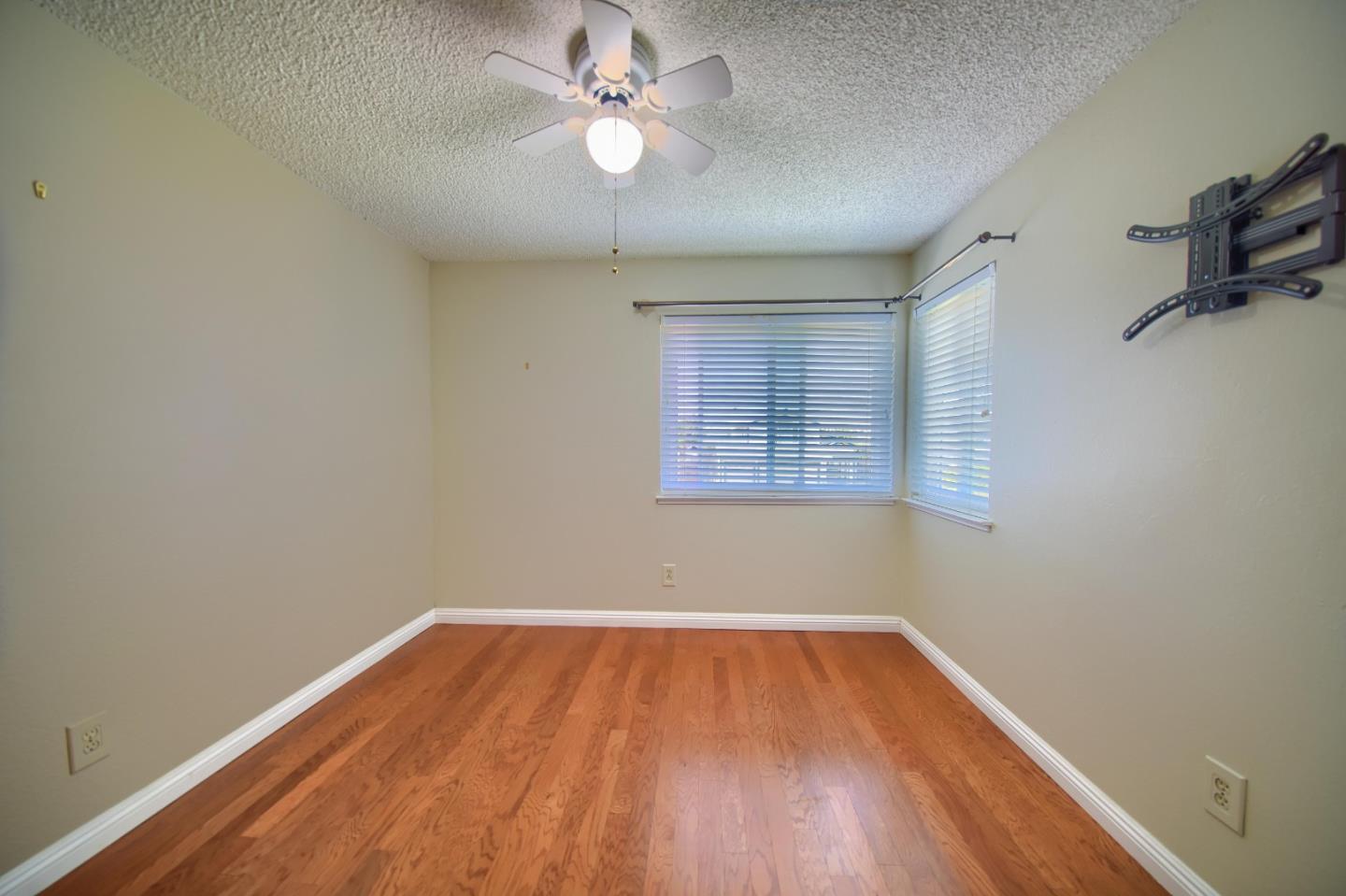 2911 Sunflower Drive Antioch, CA 94531 - Photo 45 of 69 wooden floor in an empty room with a window