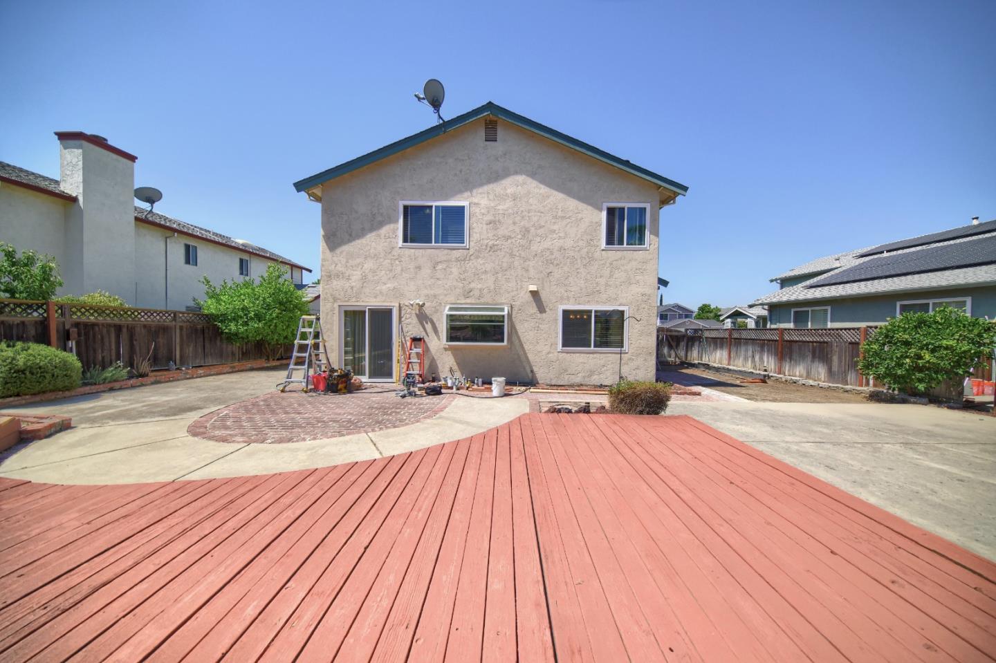 2911 Sunflower Drive Antioch, CA 94531 - Photo 56 of 69 a front view of house with yard and trees in the background