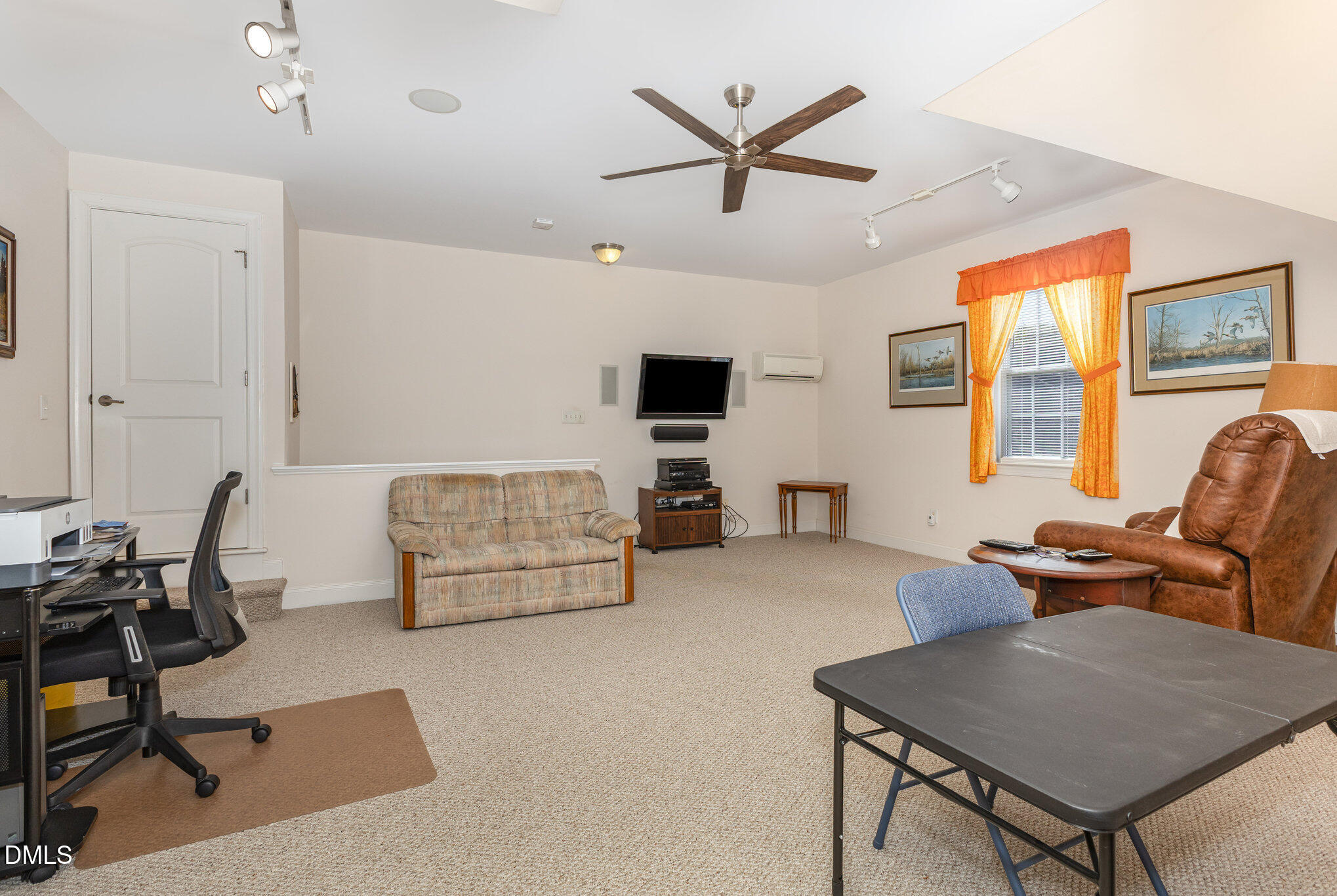 505 Easy Wind Lane Garner, NC 27529 - Photo 21 of 40 a living room with furniture and a window