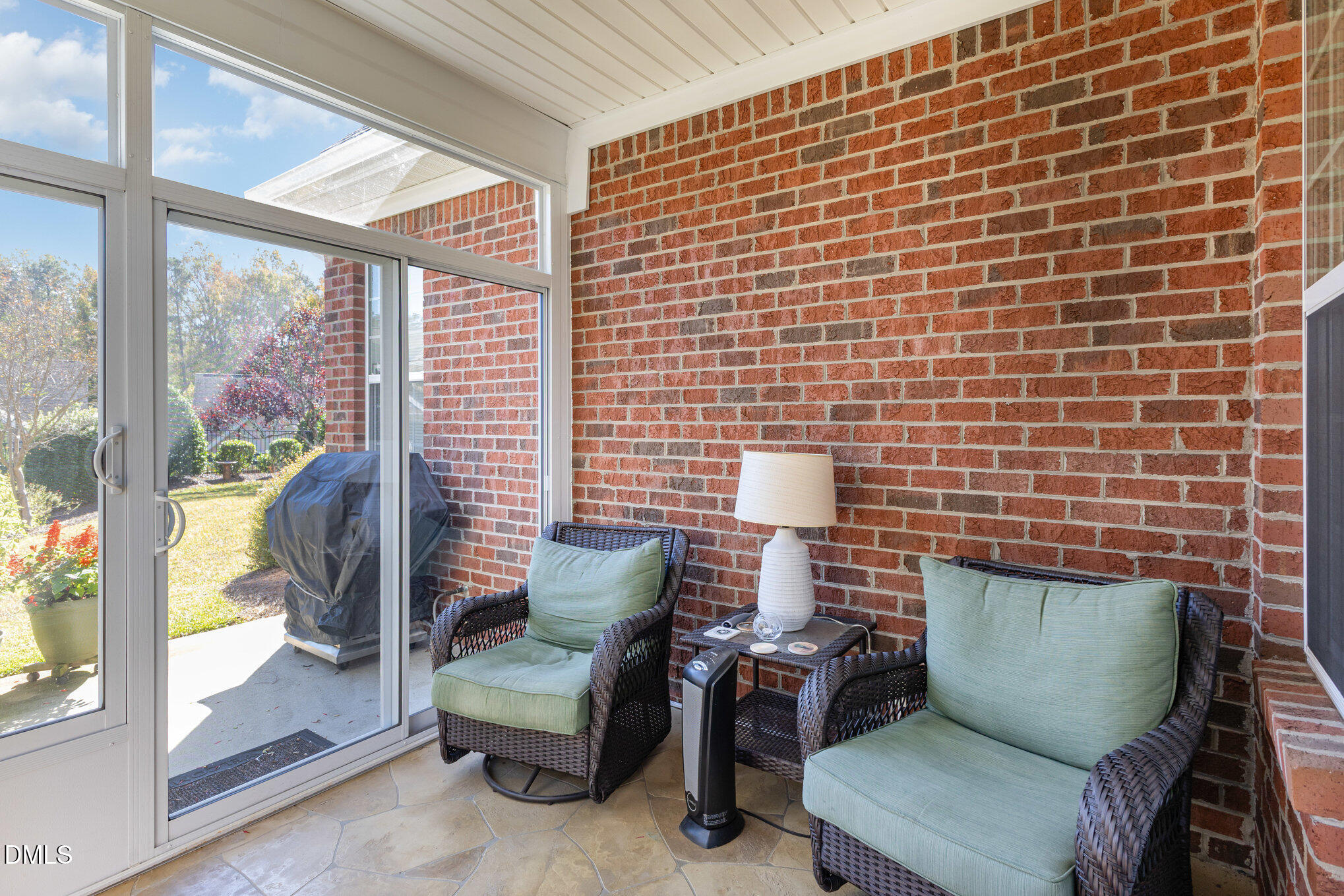 505 Easy Wind Lane Garner, NC 27529 - Photo 23 of 40 a building outdoor space with patio furniture