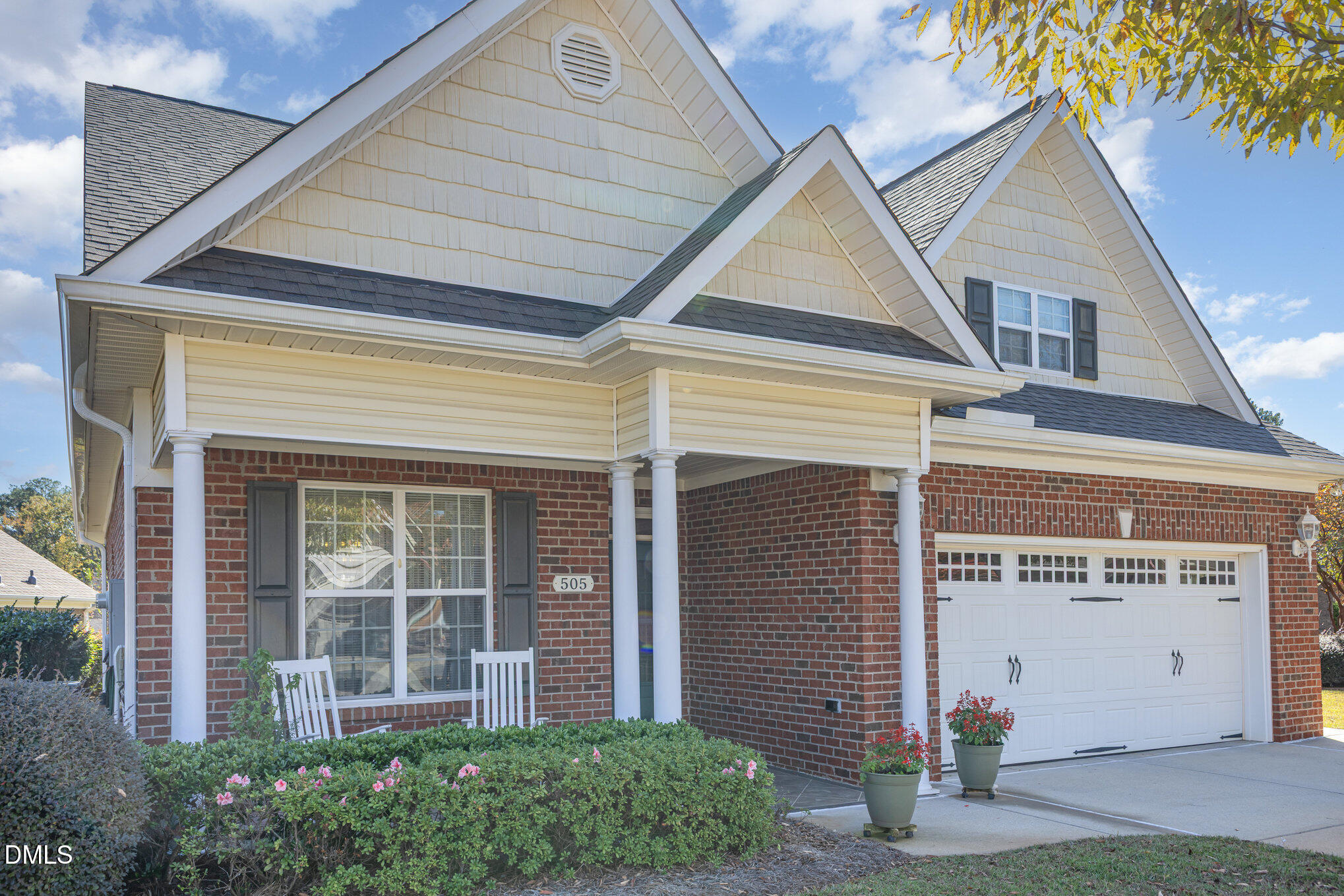 505 Easy Wind Lane Garner, NC 27529 - Photo 2 of 40 a front view of a house with a garage