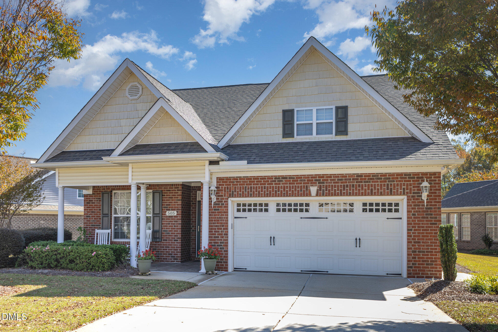 505 Easy Wind Lane Garner, NC 27529 - Photo 4 of 40 a view of a house with a garage