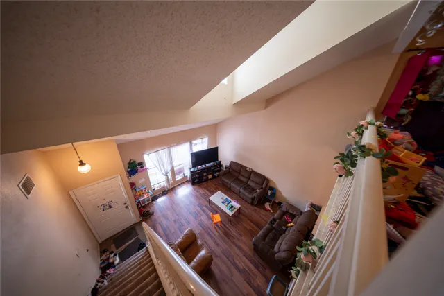 a view of a living room with furniture