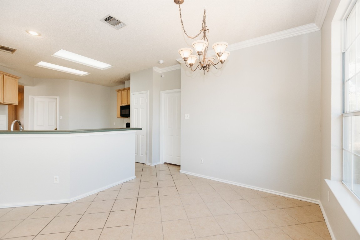 1506 Freestone Drive Pflugerville, TX 78660 - Photo 7 of 20 a view of an empty room with window